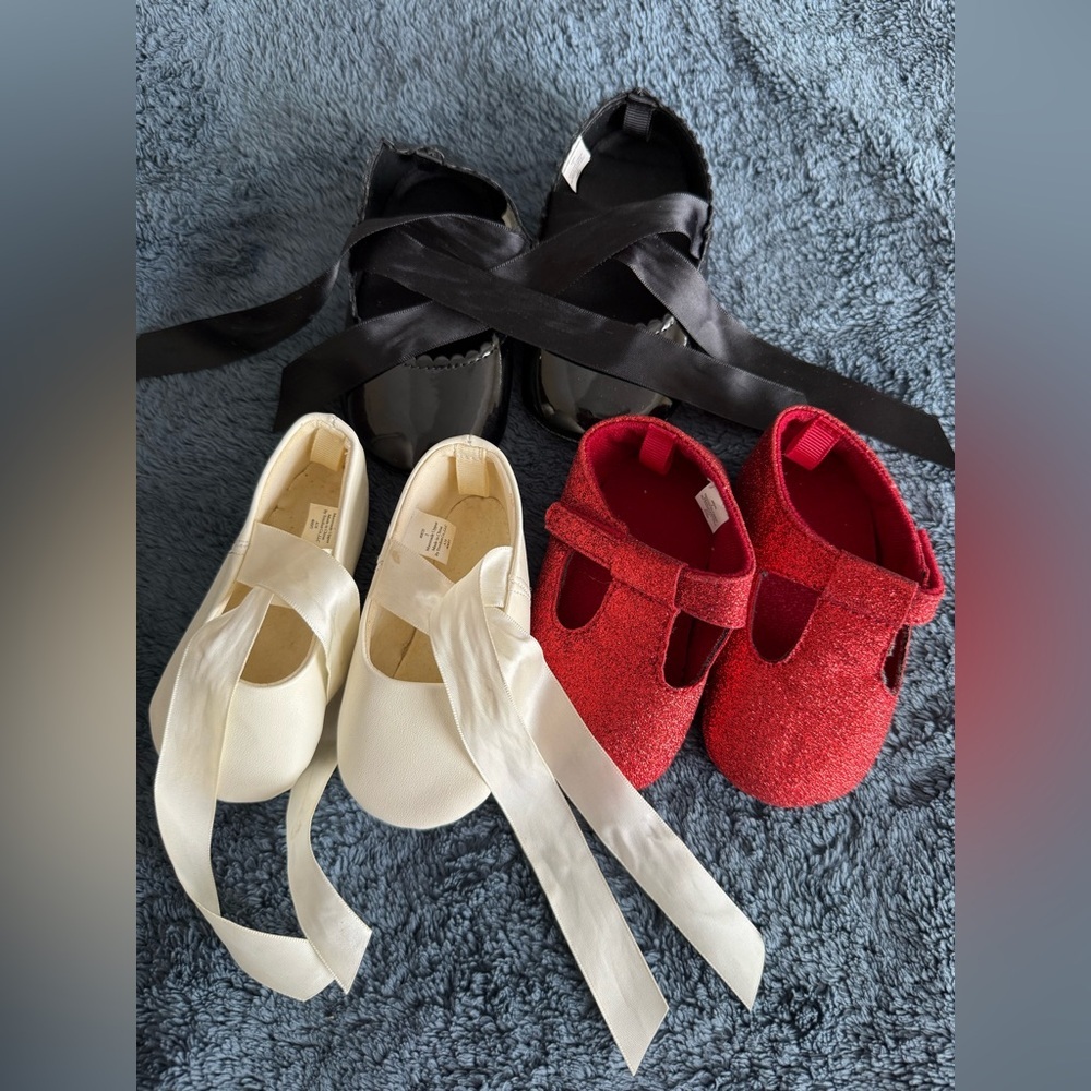 Bundle of three baby shoes in white black and red